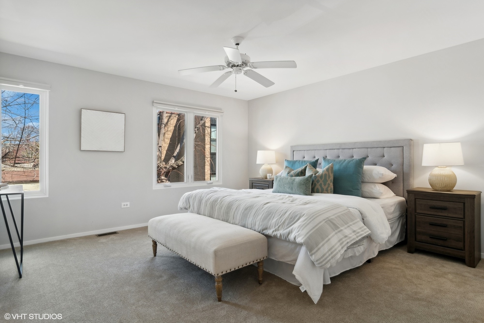 844 South Morgan Street Chicago, IL 60607 - Photo 7 of 10 a bedroom with a bed and ceiling fan