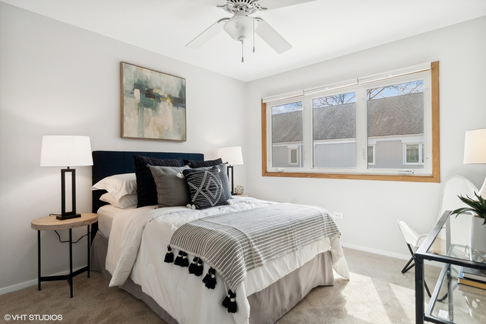 844 South Morgan Street Chicago, IL 60607 - Photo 9 of 10 a bedroom with bed and window with chair