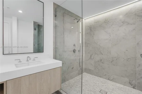 a view of a room with a large window