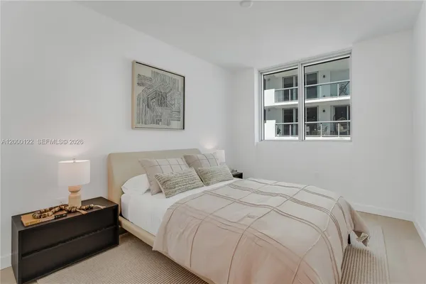 a view of a city with an ocean view