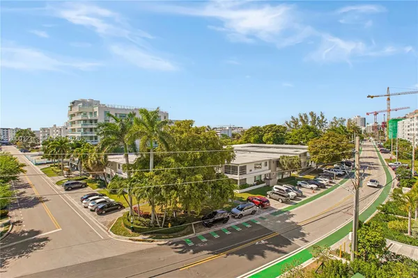 a view of a livingroom with furniture and a flat screen tv
