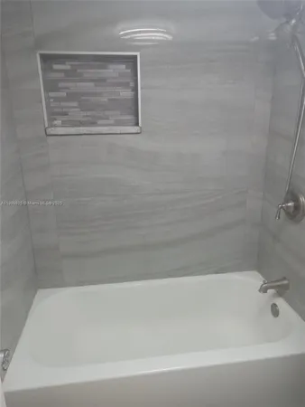 a bathroom with a bathtub