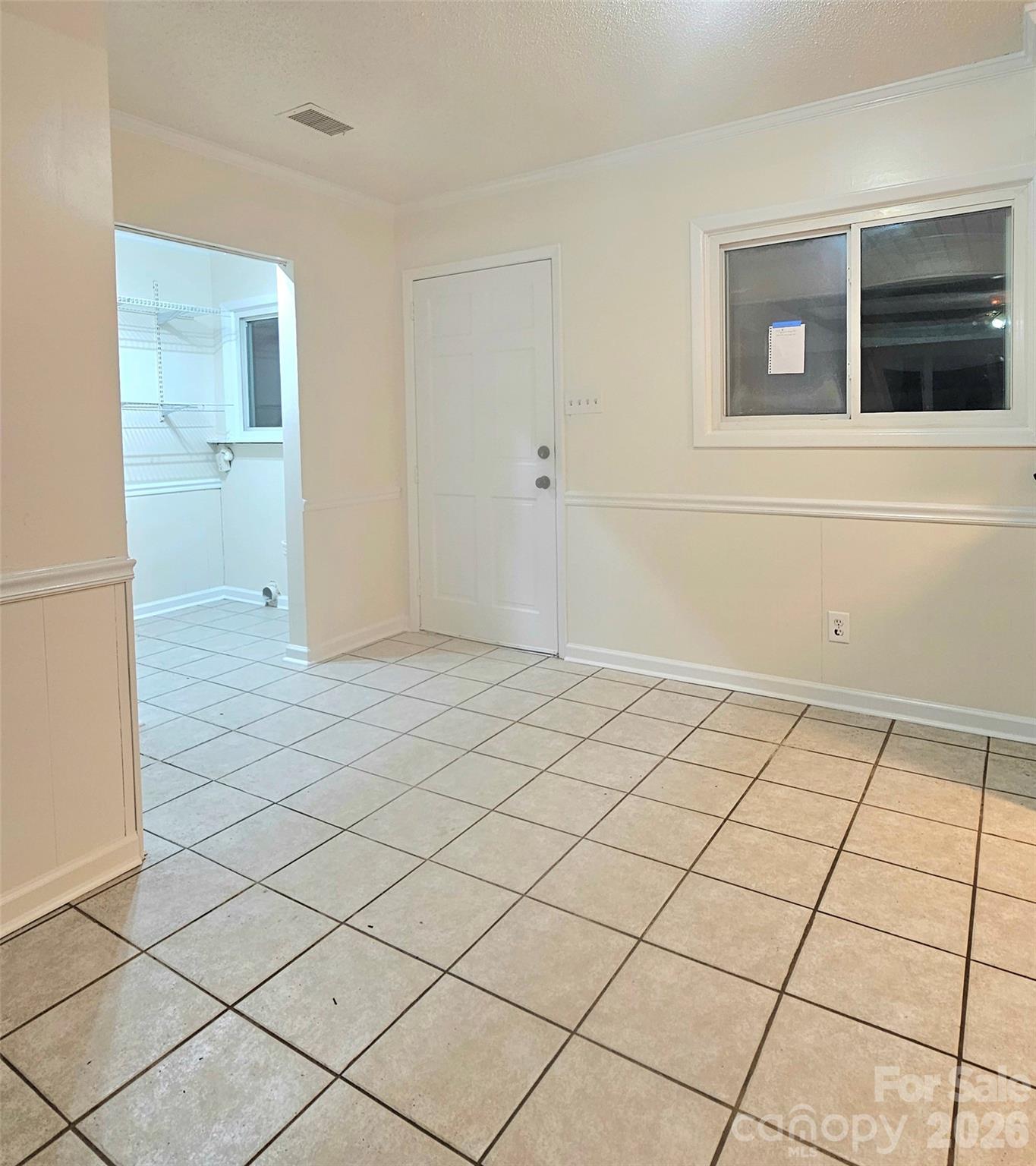 107 Oakgrove Street Locust, NC 28097 - Photo 13 of 32 a view of an empty room and window