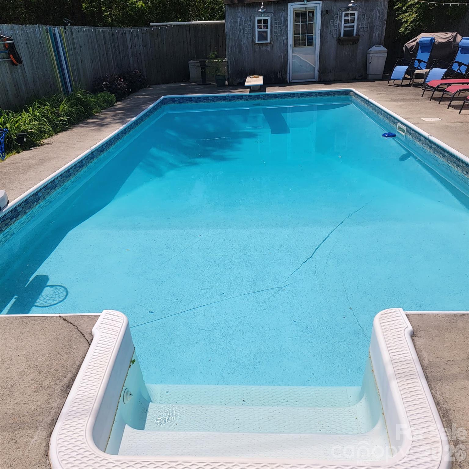 107 Oakgrove Street Locust, NC 28097 - Photo 26 of 32 a view of a backyard