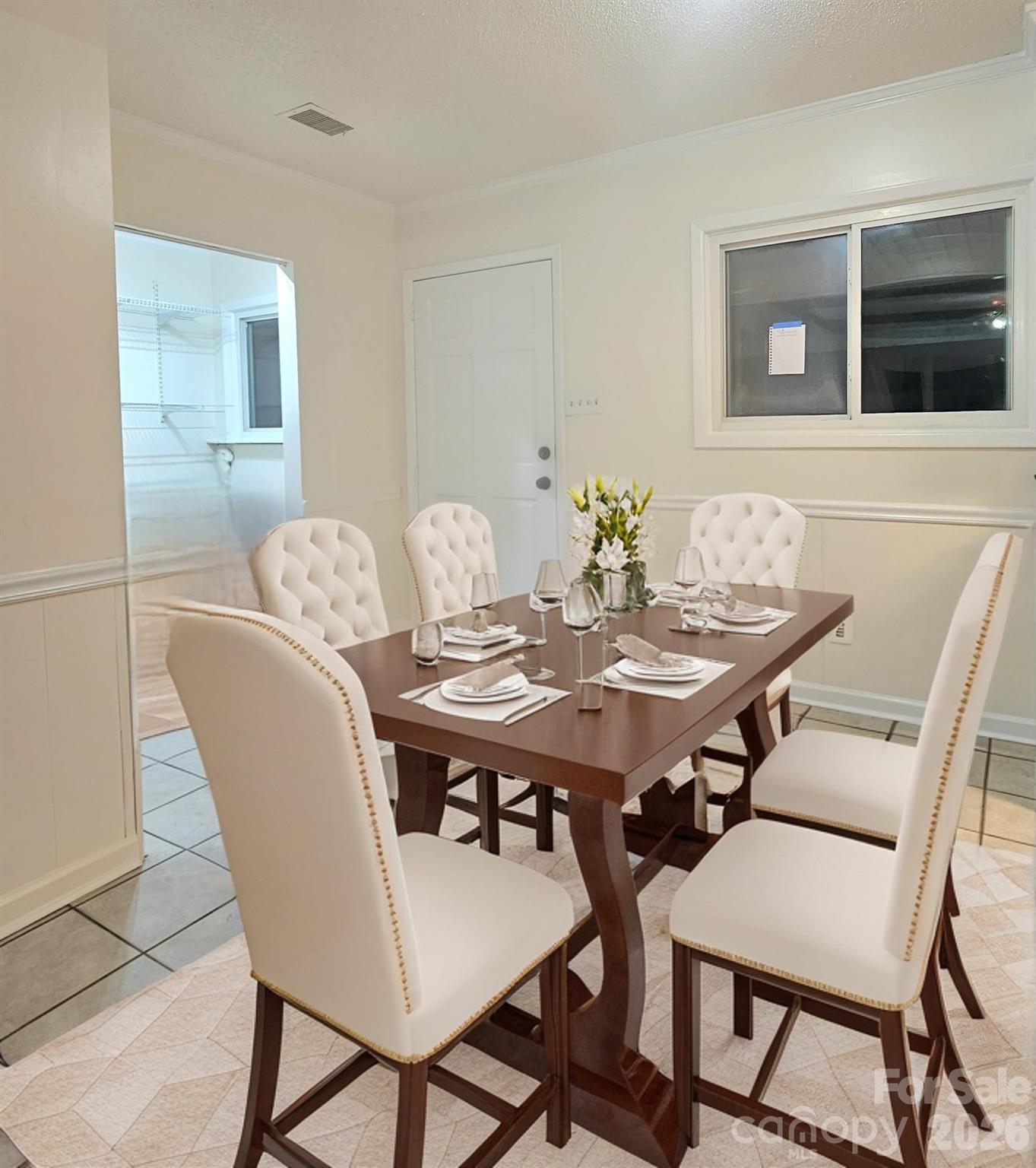 107 Oakgrove Street Locust, NC 28097 - Photo 28 of 32 a view of a dining room with furniture and wooden floor