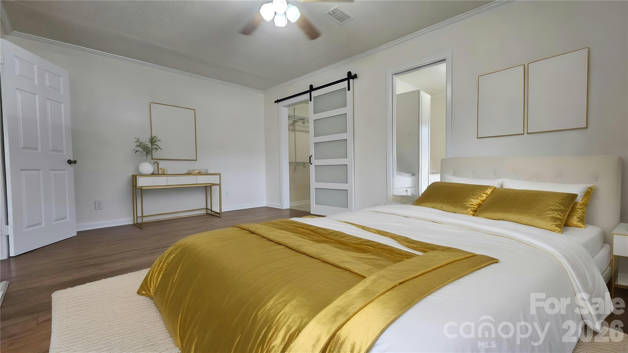 107 Oakgrove Street Locust, NC 28097 - Photo 32 of 32 a bedroom with a bed and a chandelier