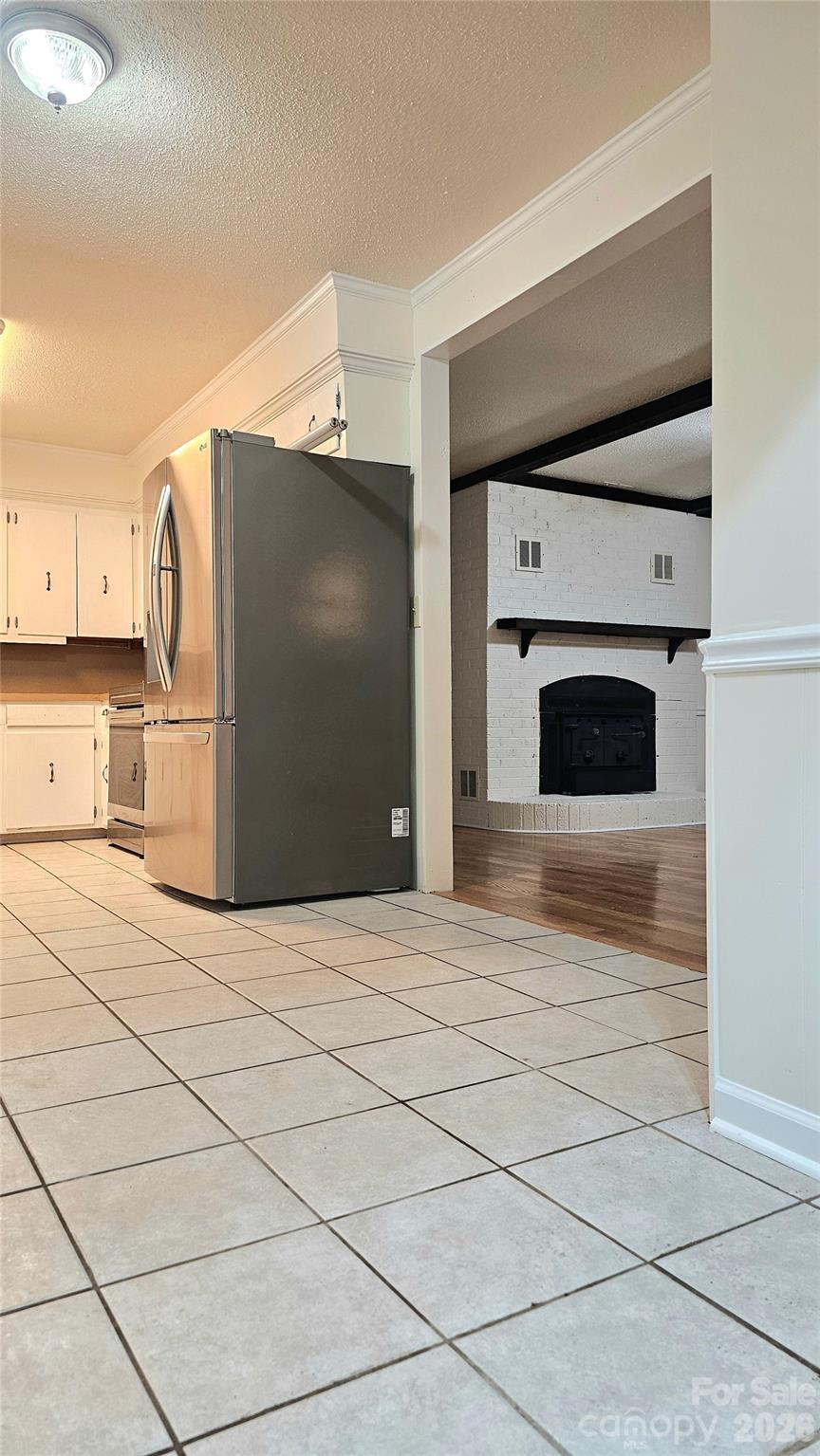 107 Oakgrove Street Locust, NC 28097 - Photo 8 of 32 a view of a livingroom with a fireplace