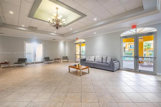 swimming pool with outdoor seating and city view