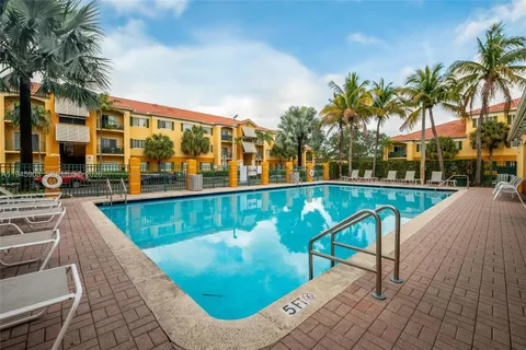 a view of a house with a swimming pool