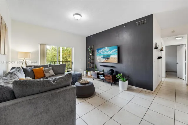 a living room with furniture and a couch