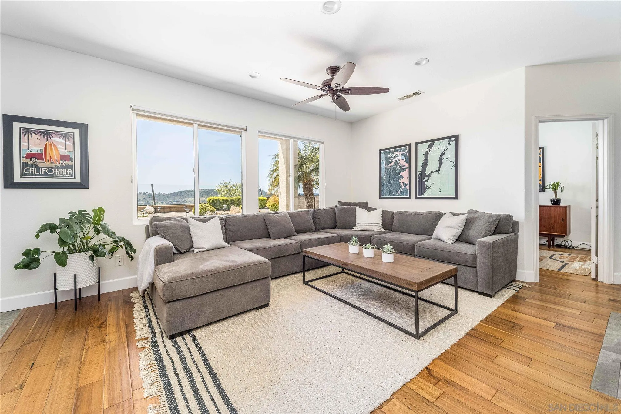 4757 Crater Rim Road Carlsbad, CA 92010 - Photo 8 of 26 a living room with furniture and a large window