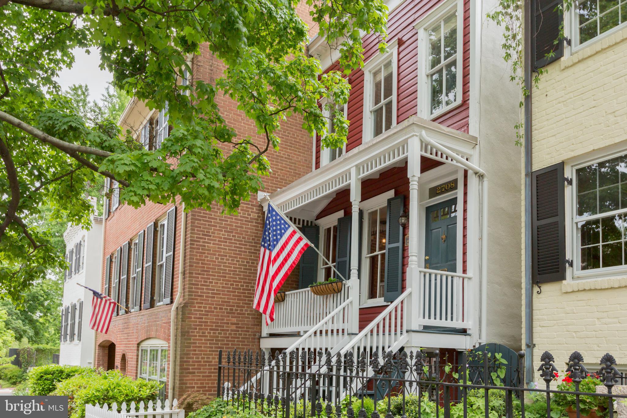 a front view of a multi story residential apartment buildings