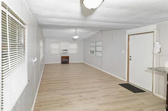 a house with trees in front of it