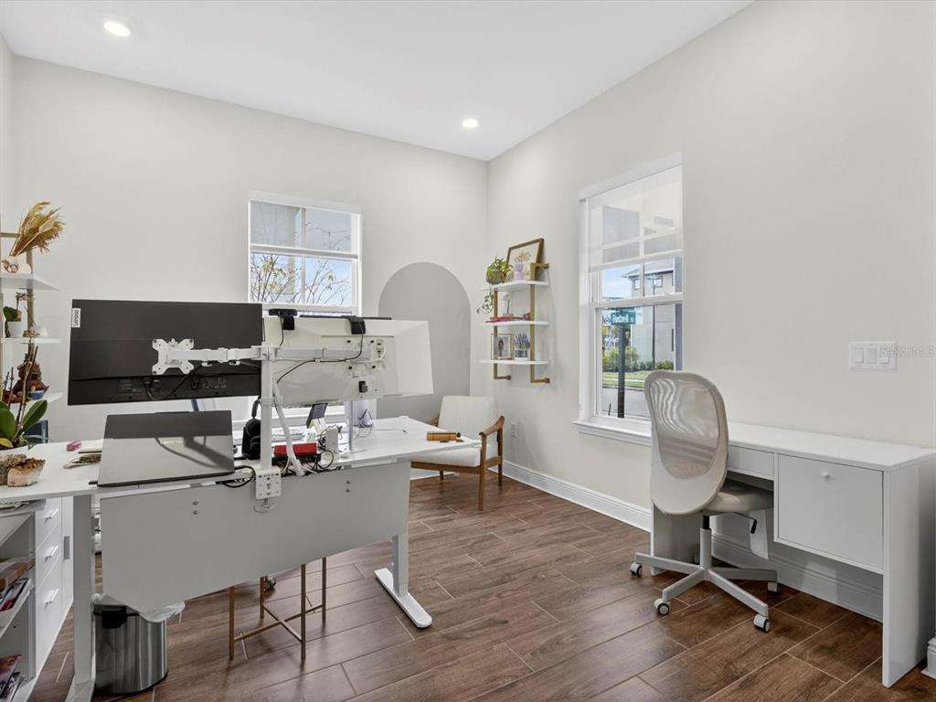 9952 Rodbell Street Orlando, FL 32827 - Photo 20 of 44 a workspace with furniture and a window