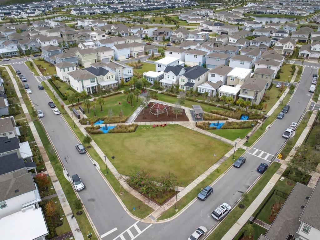 9952 Rodbell Street Orlando, FL 32827 - Photo 38 of 44 an aerial view of a tennis ground