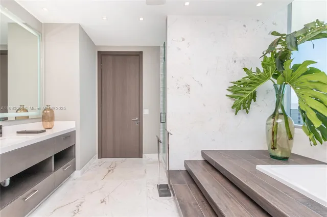 a view of a balcony with wooden floor