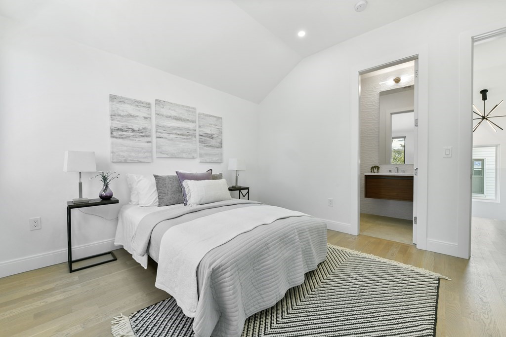 63 Alpine Street, Unit 1 Cambridge, MA 02138 - Photo 11 of 27 a bedroom with a bed and dresser