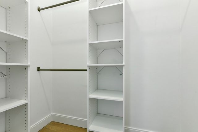 a hallway with closet