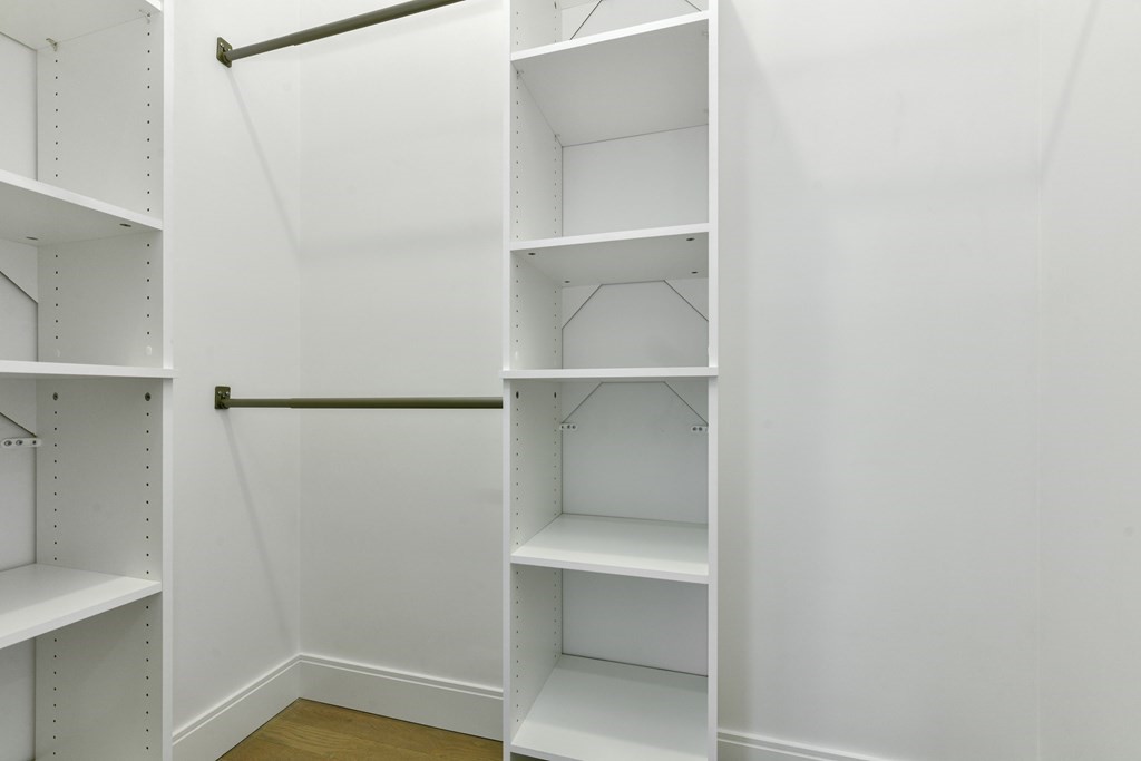 63 Alpine Street, Unit 1 Cambridge, MA 02138 - Photo 12 of 27 a hallway with closet