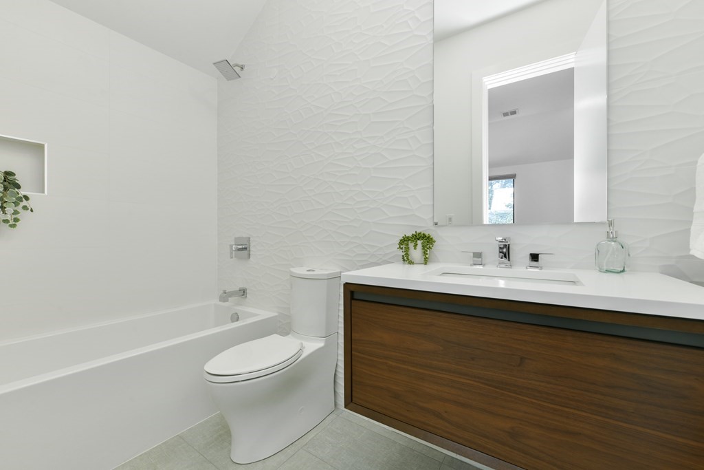 63 Alpine Street, Unit 1 Cambridge, MA 02138 - Photo 13 of 27 a bathroom with a sink a toilet and shower