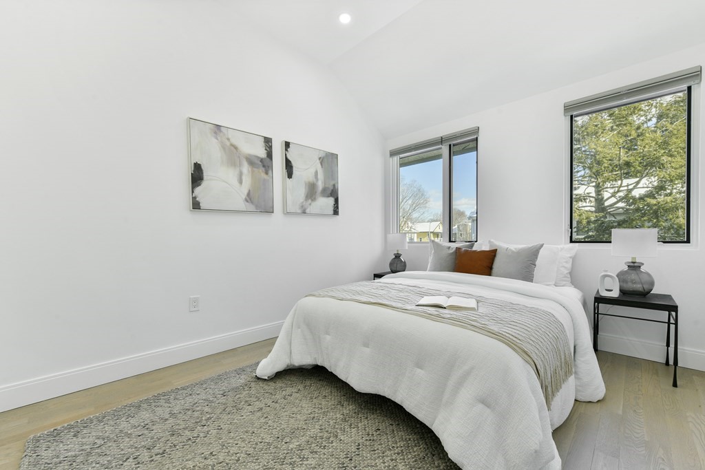 63 Alpine Street, Unit 1 Cambridge, MA 02138 - Photo 14 of 27 a bedroom with a bed and window