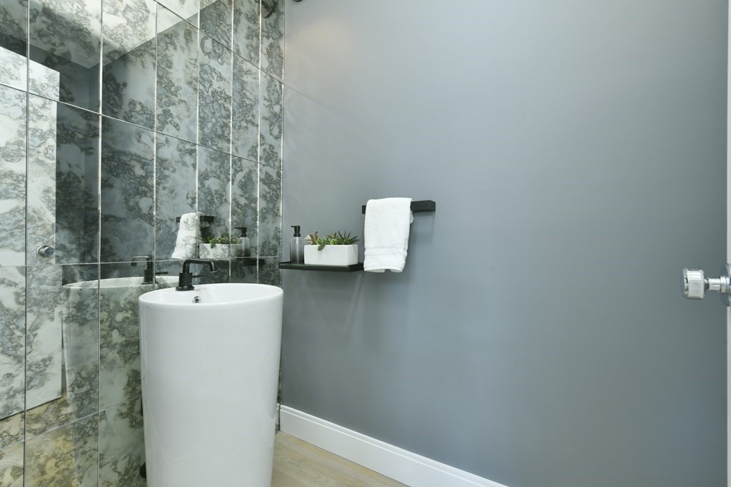 63 Alpine Street, Unit 1 Cambridge, MA 02138 - Photo 19 of 27 a bathroom with a sink a toilet and shower