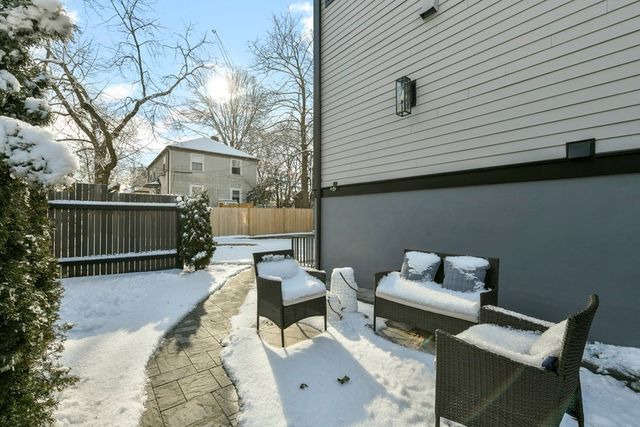 a view of a deck with furniture