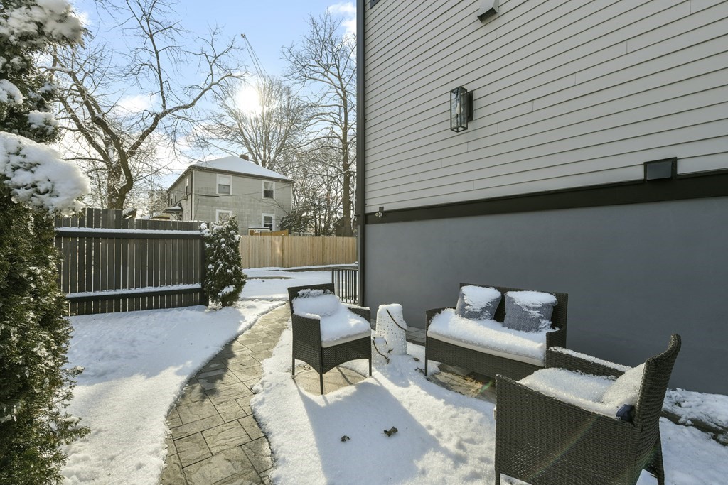 63 Alpine Street, Unit 1 Cambridge, MA 02138 - Photo 22 of 27 a view of a deck with furniture