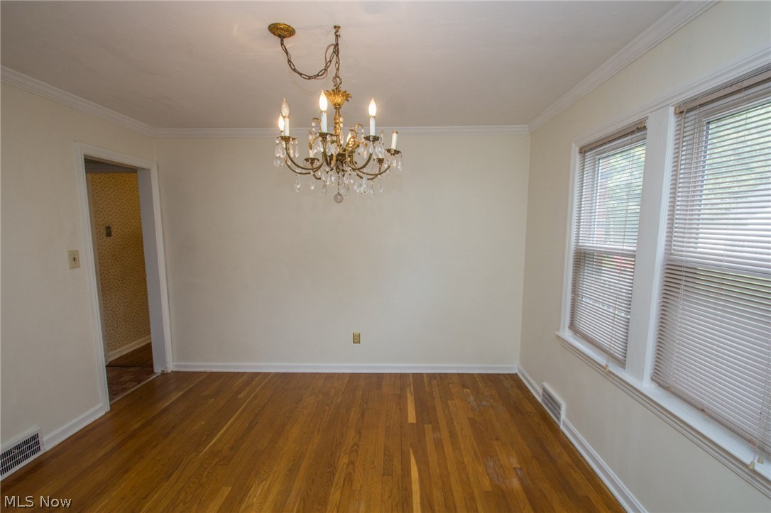 2384 Ashurst Road University Heights, OH 44118 - Photo 4 of 28 Down dining room with hardwood floors