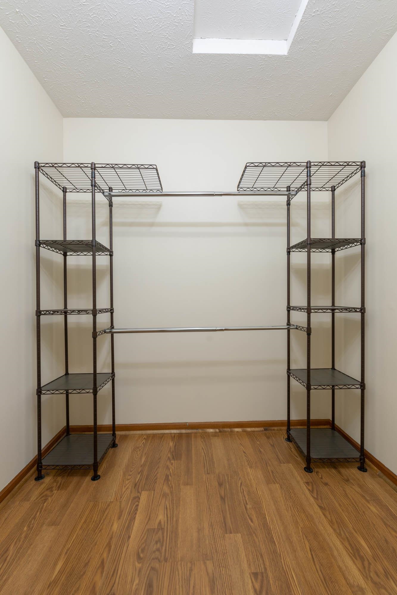 10686 Meadowsweet Lane Roscoe, IL 61073 - Photo 18 of 33 a view of a room with racks on the wall