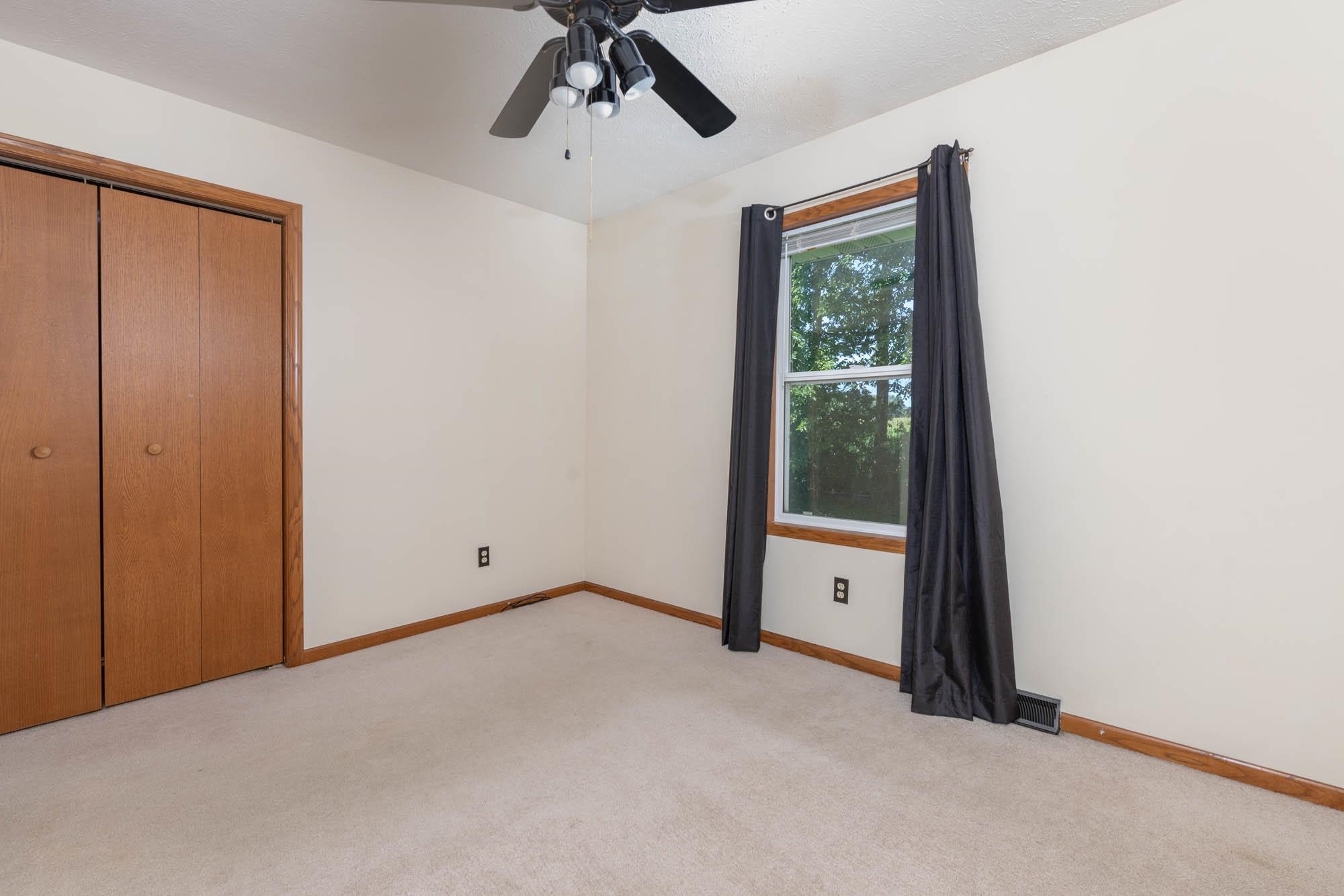 10686 Meadowsweet Lane Roscoe, IL 61073 - Photo 20 of 33 a view of an empty room with a window