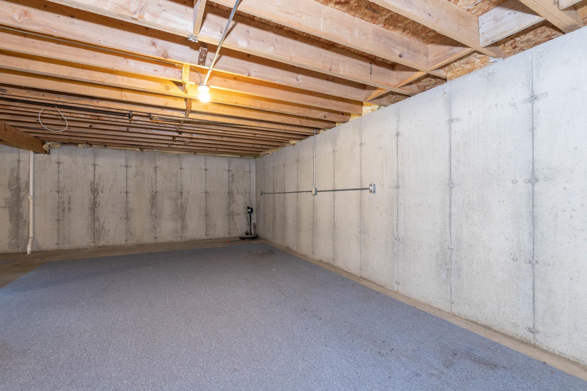 10686 Meadowsweet Lane Roscoe, IL 61073 - Photo 27 of 33 a view of a room with a white walls and wooden walls
