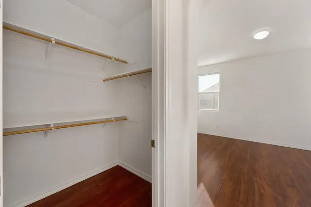 a view of small space with racks on the wall