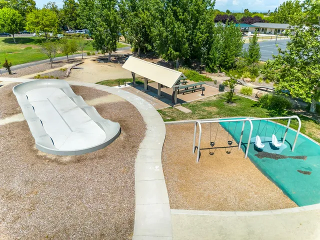 swimming pool view with a outdoor seating