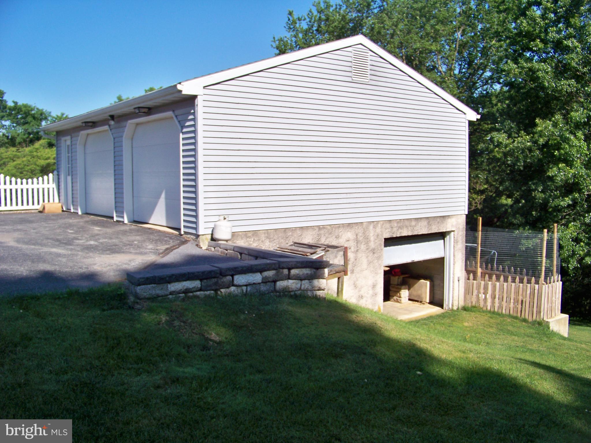 151 Reservoir Road Strasburg, PA 17579 - Photo 8 of 9 Detached Garage Shop Overhead Door