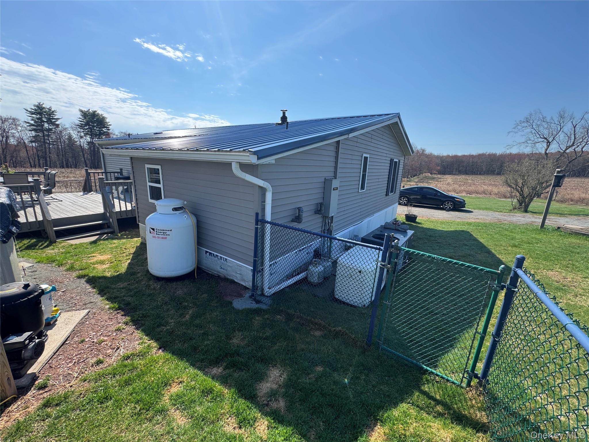 42 Fittkau Road Swan Lake, NY 12783 - Photo 22 of 36 a view of a backyard with sitting area