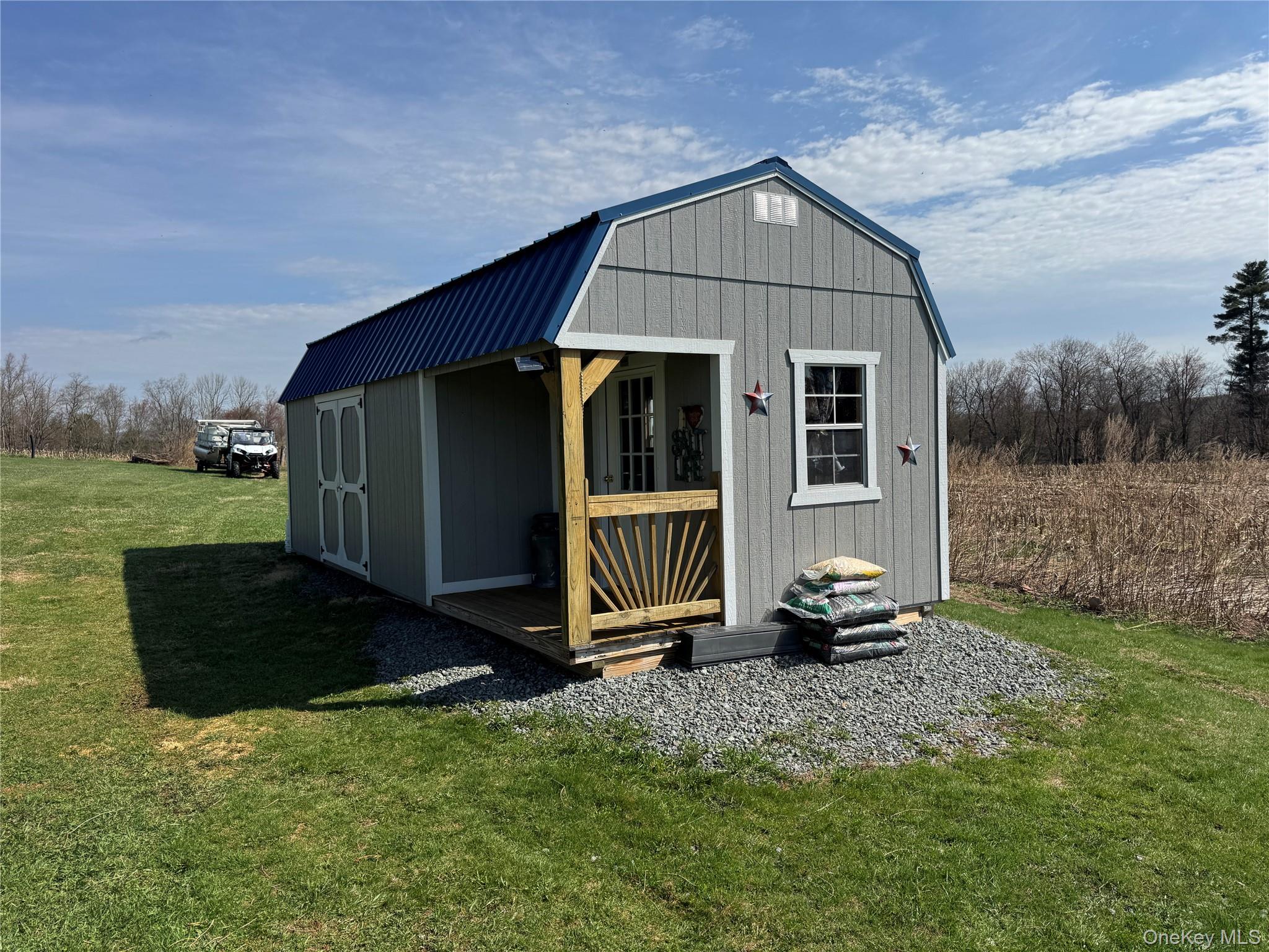 42 Fittkau Road Swan Lake, NY 12783 - Photo 26 of 36 a front view of a house with a yard