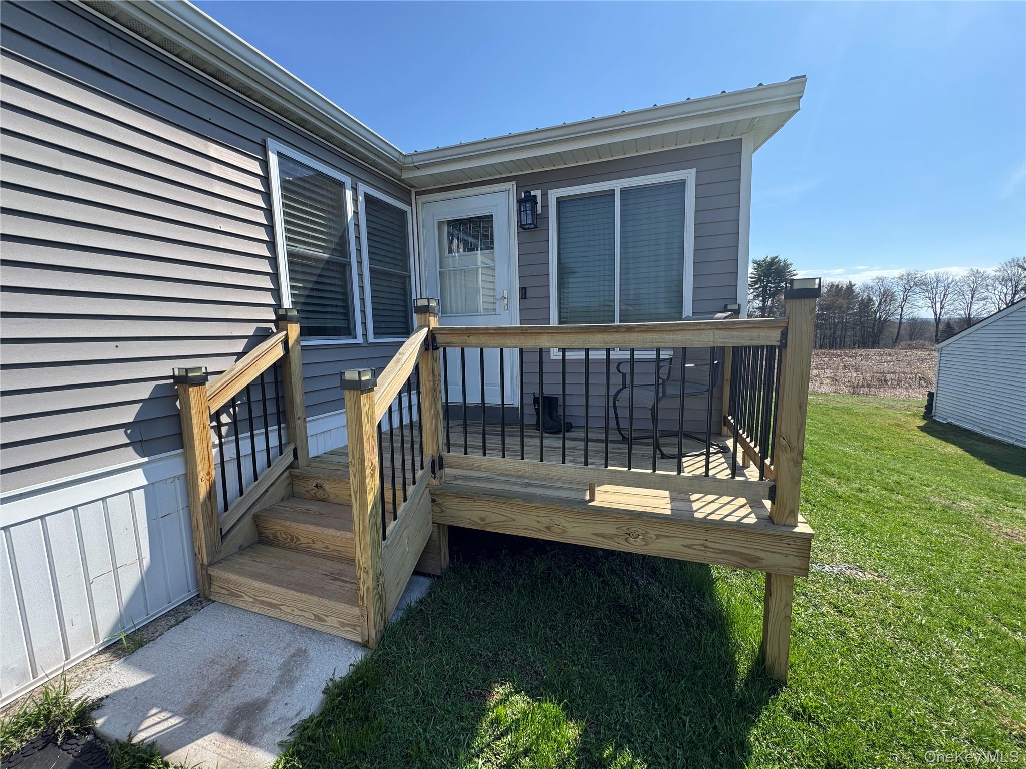 42 Fittkau Road Swan Lake, NY 12783 - Photo 4 of 36 a view of deck with a chair