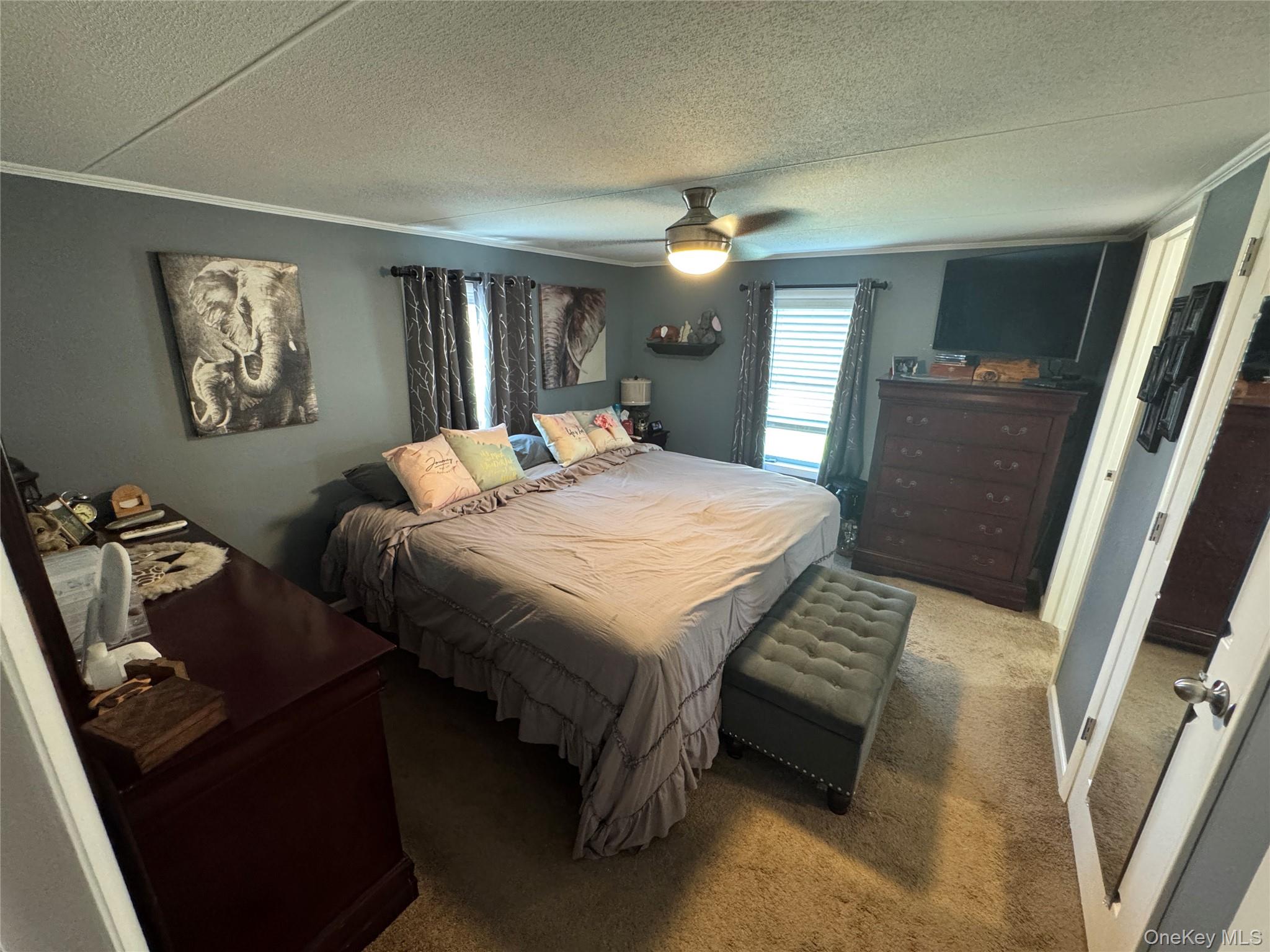 42 Fittkau Road Swan Lake, NY 12783 - Photo 6 of 36 a bedroom with a bed and a dresser