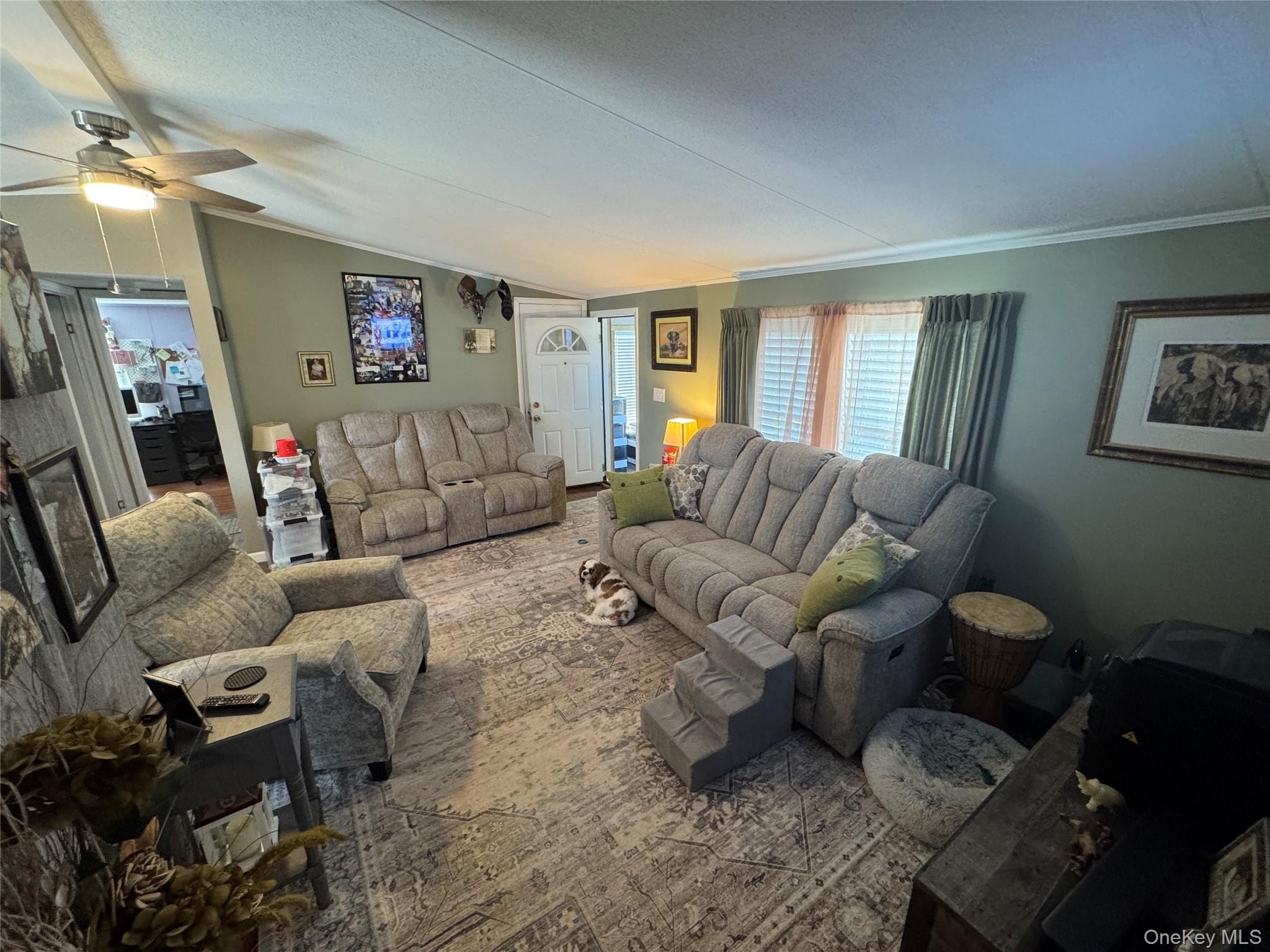 42 Fittkau Road Swan Lake, NY 12783 - Photo 8 of 36 a living room with furniture and a window