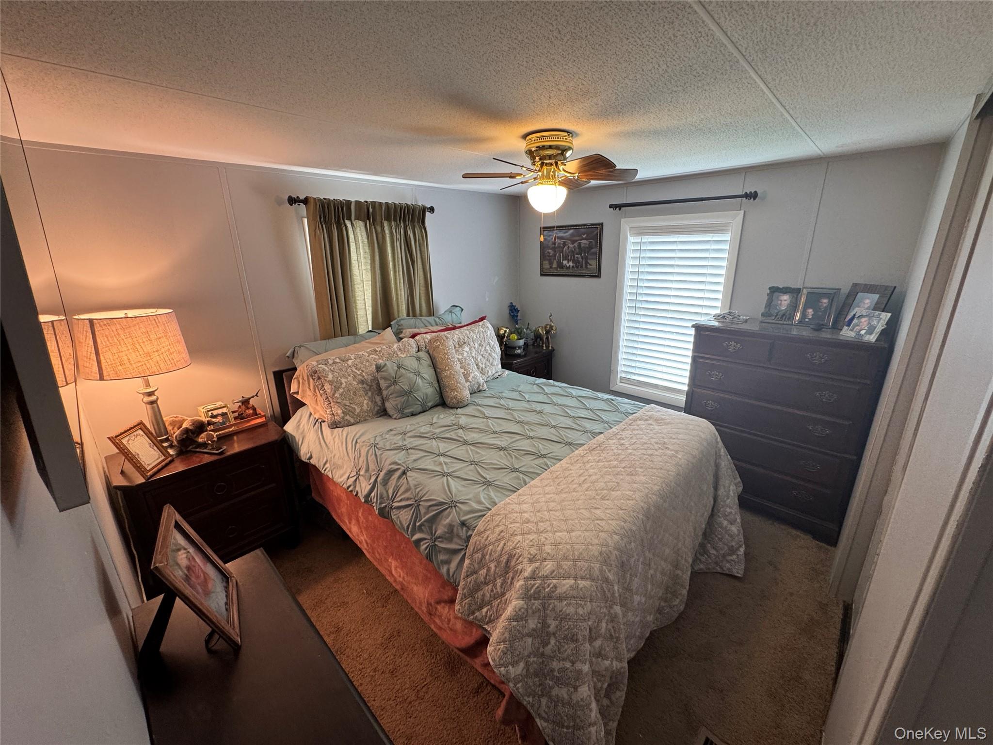 42 Fittkau Road Swan Lake, NY 12783 - Photo 10 of 36 a bedroom with a bed and window