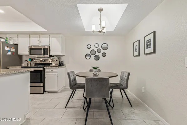 a view of a dining room with furniture