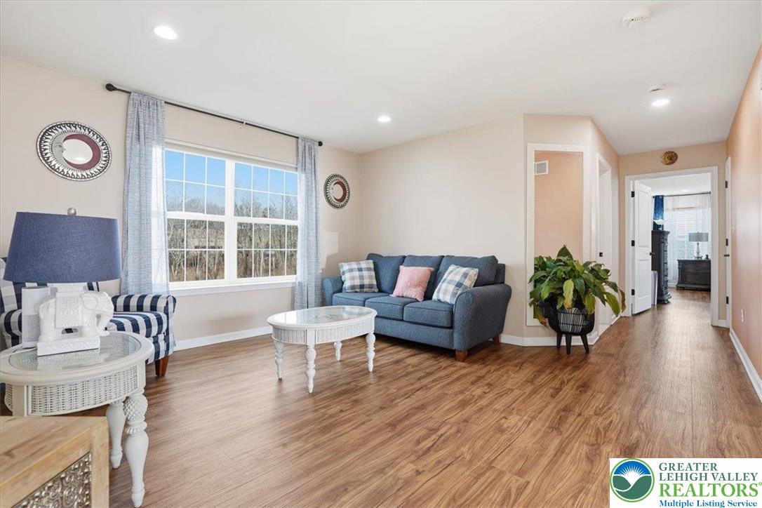 628 South 4th Street Bangor, PA 18013 - Photo 11 of 97 a living room with furniture and a wooden floor
