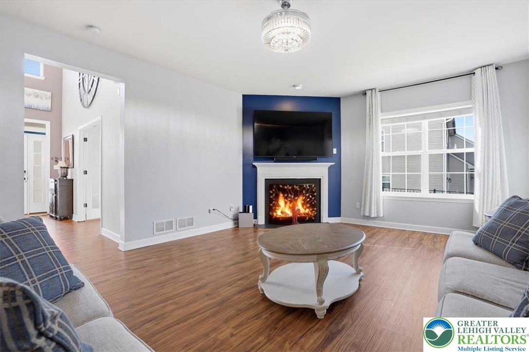 628 South 4th Street Bangor, PA 18013 - Photo 15 of 97 a living room with furniture and a fireplace