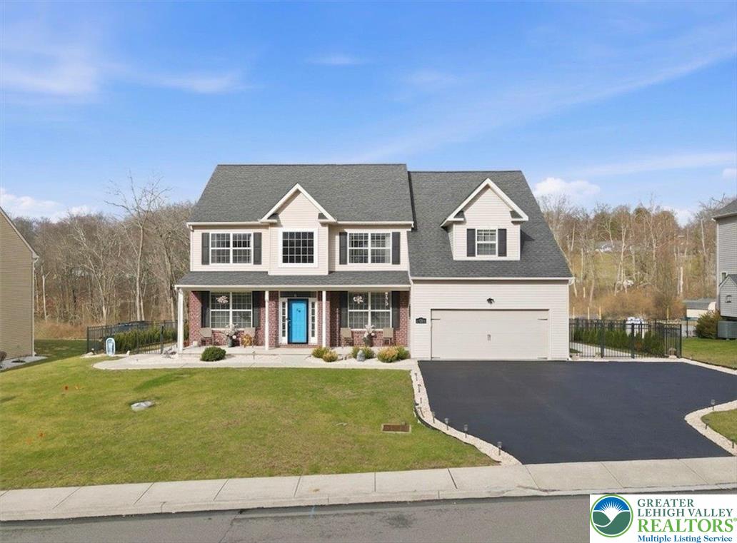 628 South 4th Street Bangor, PA 18013 - Photo 2 of 97 a front view of a house with garden