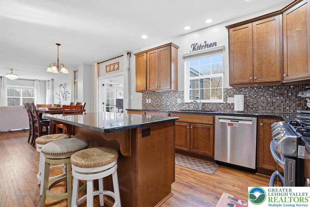 628 South 4th Street Bangor, PA 18013 - Photo 29 of 97 a kitchen with sink cabinets dining table and chairs