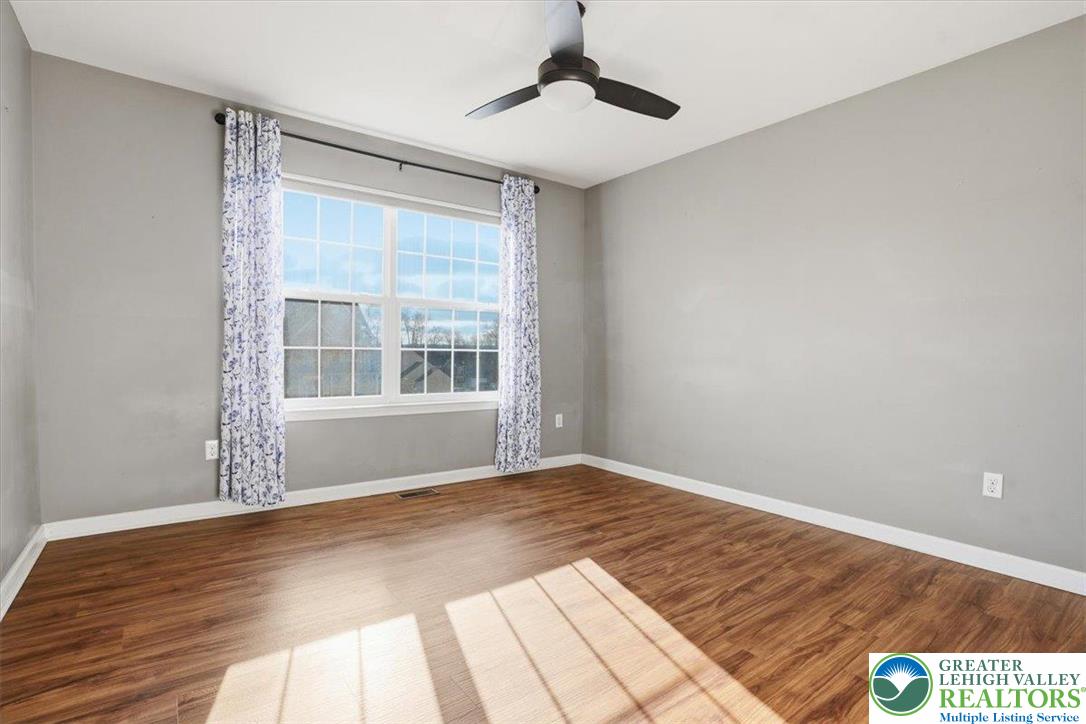 628 South 4th Street Bangor, PA 18013 - Photo 45 of 97 a view of an empty room with wooden floor and a window