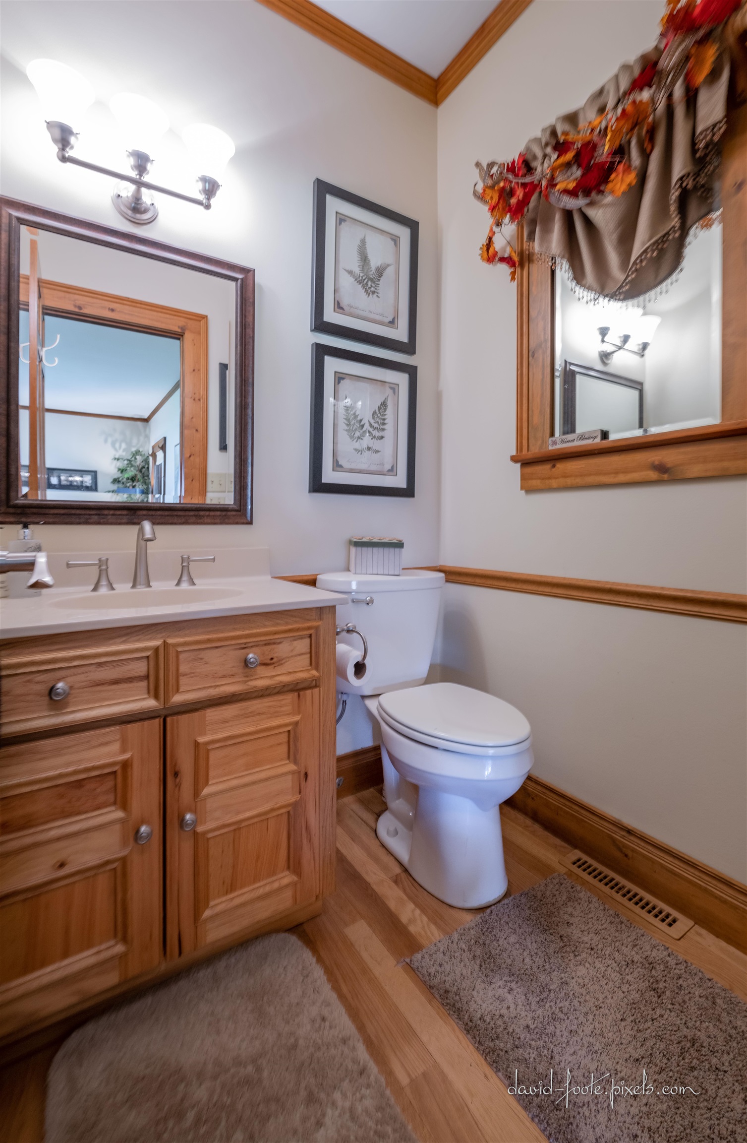 8936 North Cedarville Road Lena, IL 61048 - Photo 17 of 51 a bathroom with a toilet a sink and a mirror