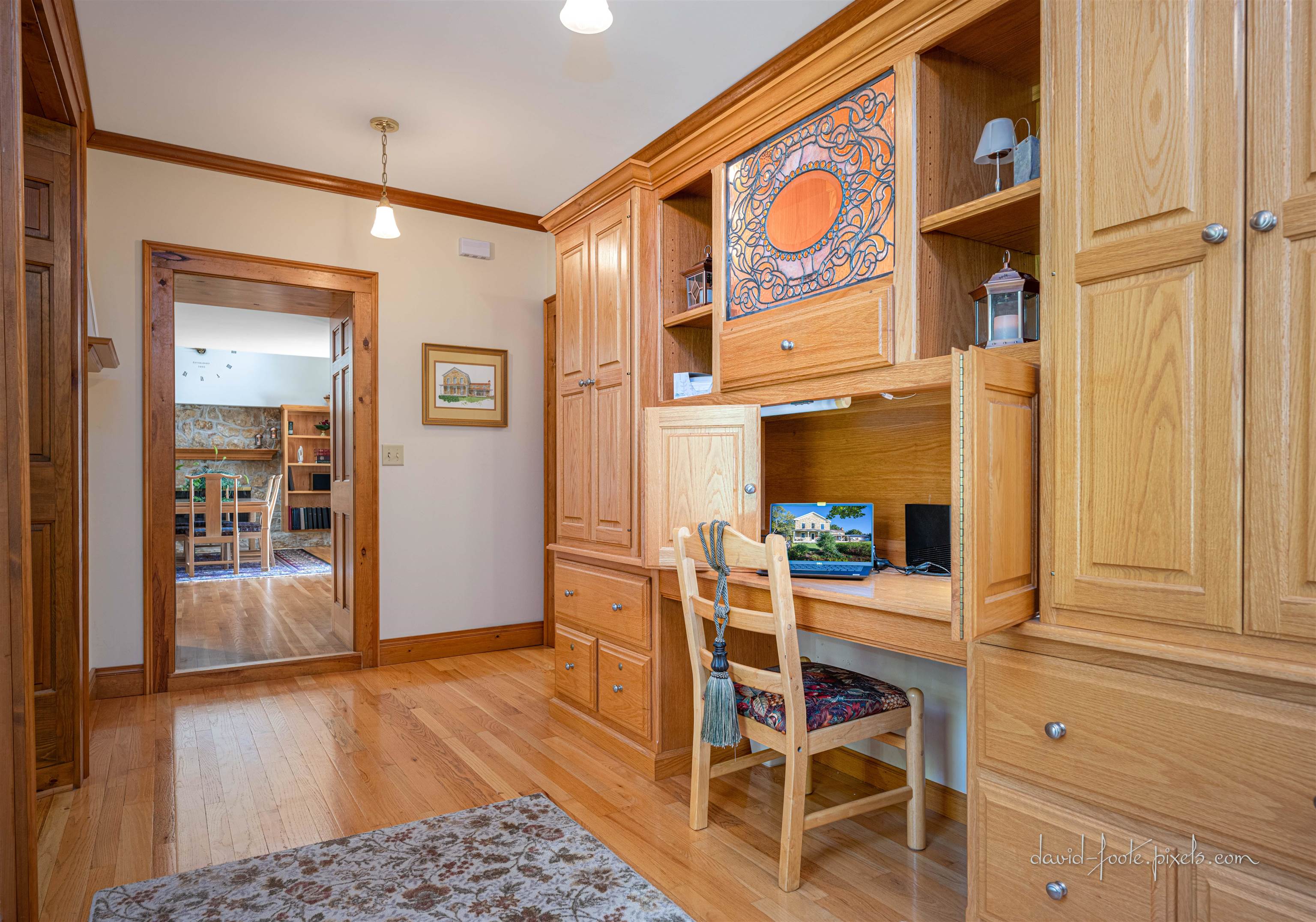 8936 North Cedarville Road Lena, IL 61048 - Photo 19 of 51 a view of a hallway with wooden floor and cabinet