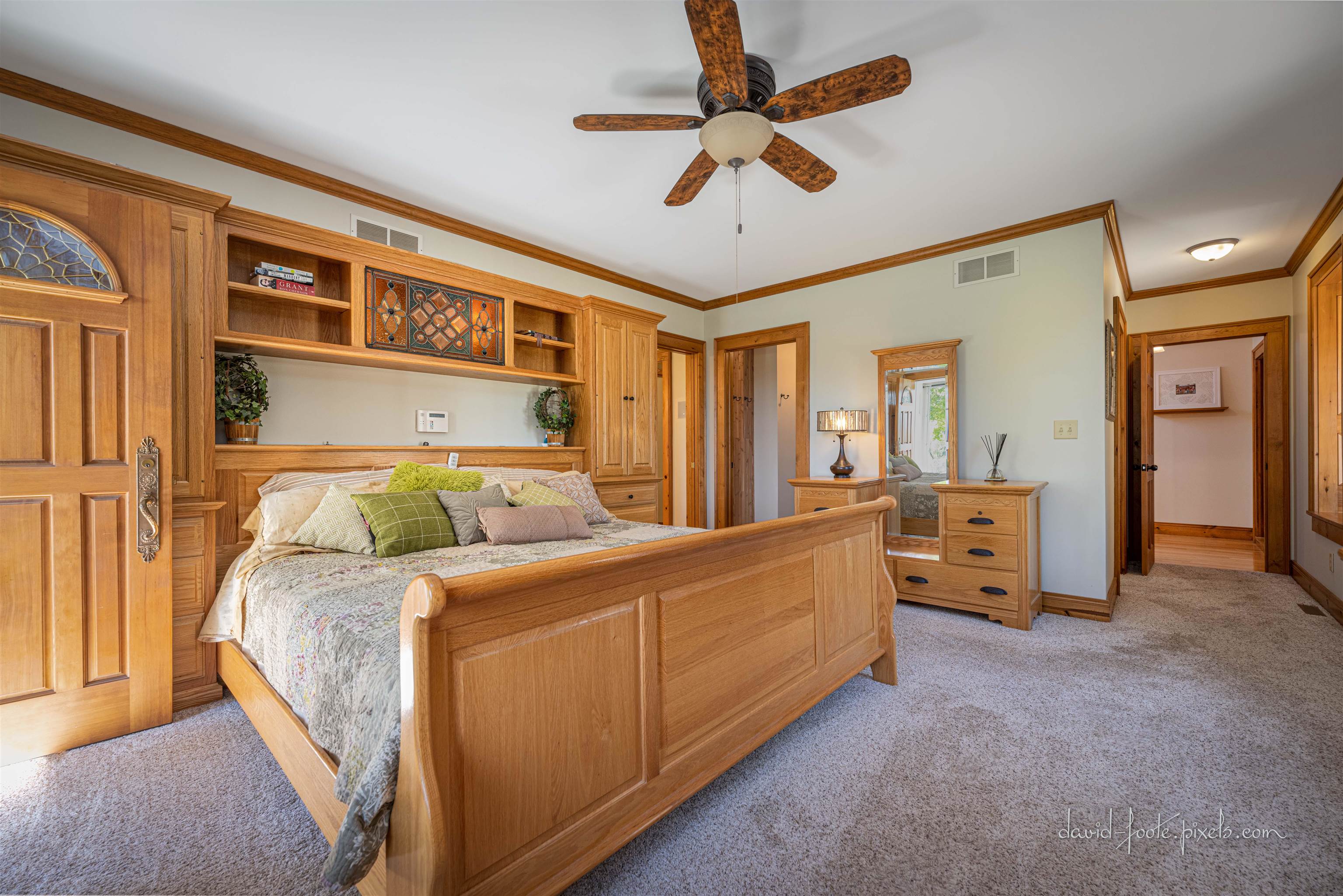 8936 North Cedarville Road Lena, IL 61048 - Photo 21 of 51 a bed room with a bed and a chandelier